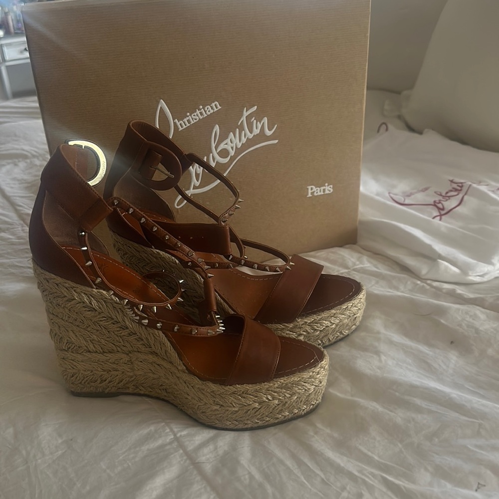 Christian Louboutin wedges, perfect for Summer, or any occasion. Worn once.
